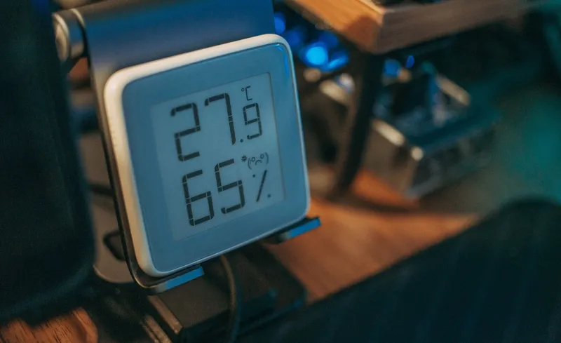 Digital thermo-hygrometer showing room temperature and relative humidity